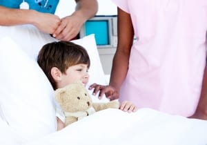 ittle Boy Hugging A Teddy Bear before surgery